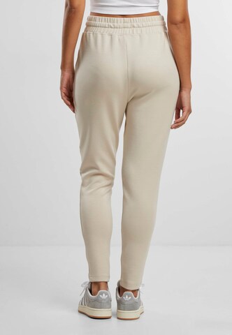 Effilé Pantalon de sport Aim'n en beige