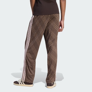 Loosefit Pantaloni 'Firebird' di ADIDAS ORIGINALS in marrone