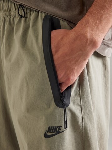 Nike Sportswear Конический (Tapered) Штаны 'Tech' в Зеленый