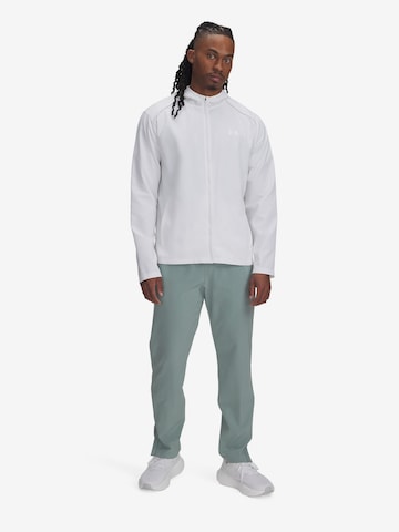 UNDER ARMOUR Sports trousers in Green: front