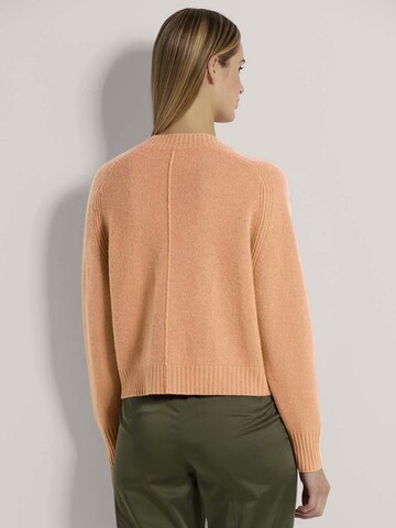 MADELEINE Gebreid vest in Oranje