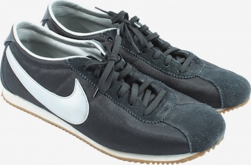 NIKE Sneakers & Trainers in 40,5 in Black: front