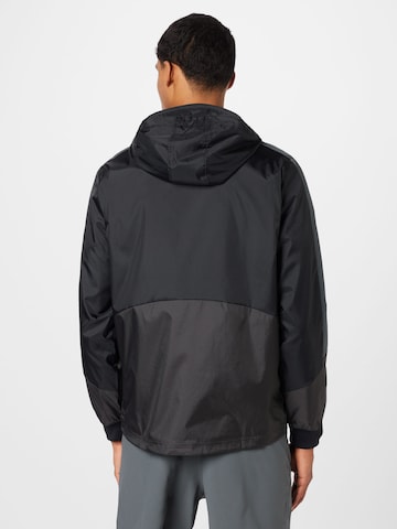 UNDER ARMOUR Athletic Jacket in Black