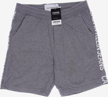 Calvin Klein Jeans Shorts in 31-32 in Grey: front