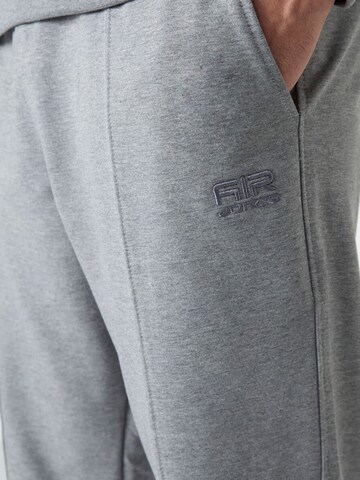 Tuta da jogging di Tommy Life in grigio