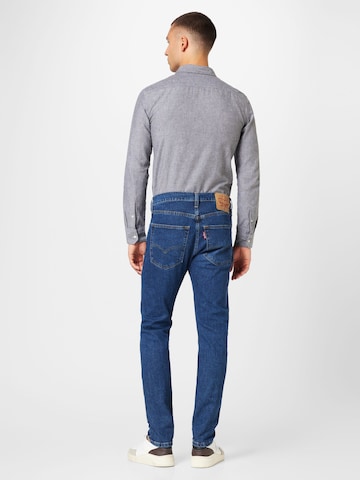 LEVI'S ® Tapered Jeans '512 Slim Taper Lo Ball' in Blauw