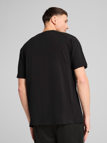 Maglia funzionale di PUMA in nero