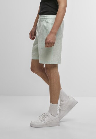 Regular Pantalon Urban Classics en vert