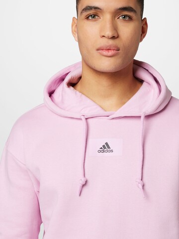 ADIDAS SPORTSWEAR Athletic Sweatshirt 'Essentials Feelvivid  Fleece Drop Shoulder' in Pink