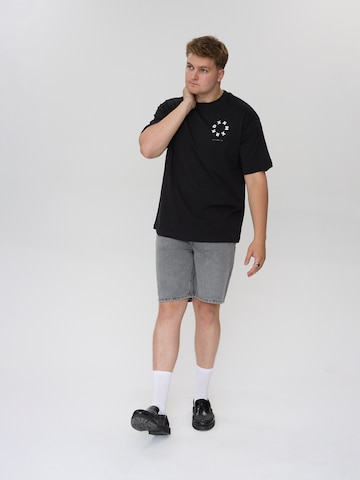 Maglia trikot 'Galal' di Dxnmxrk in nero
