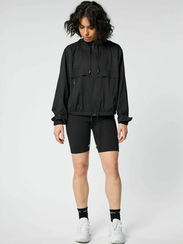 Girlfriend Collective Skinny Sportbroek in Zwart