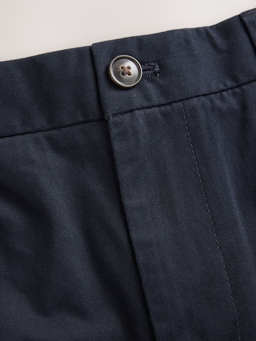 Next Slimfit Chinobyxa i blå