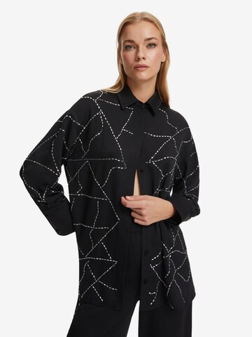 NOCTURNE - Blusa en negro