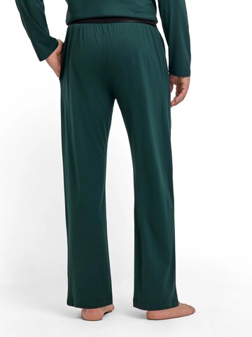 FALKE Regular Workout Pants in Green