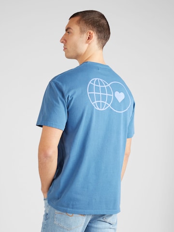 Revolution T-Shirt in Blau: predná strana