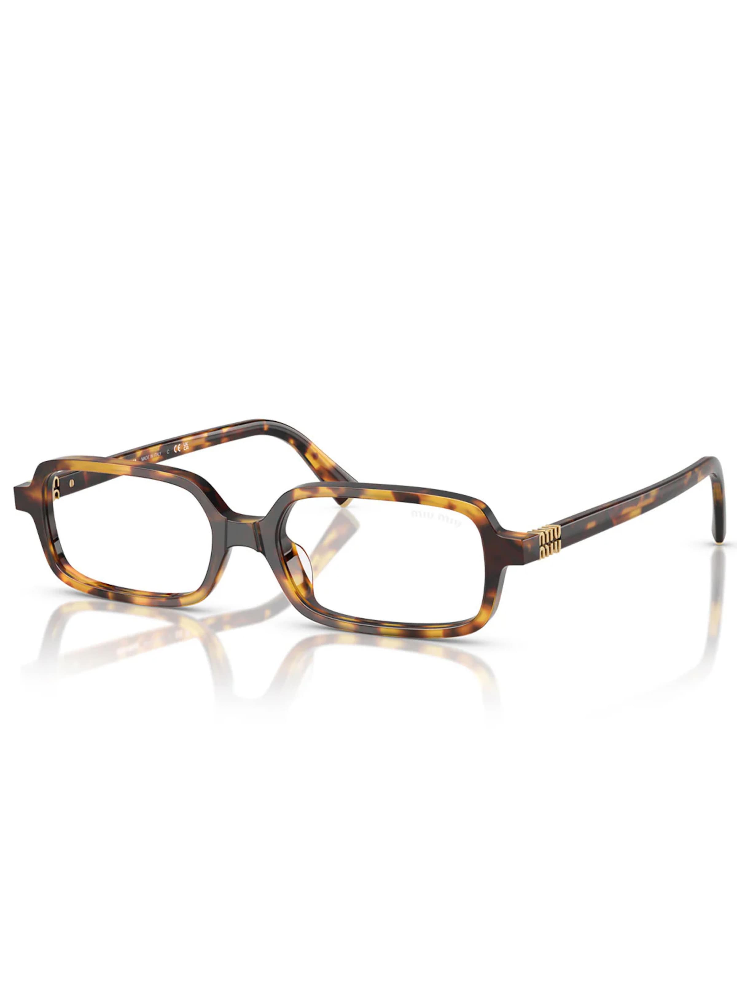 Miu Miu Sunglasses in Brown