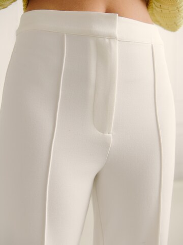 Guido Maria Kretschmer Women Boot cut Pants 'Raquel' in White