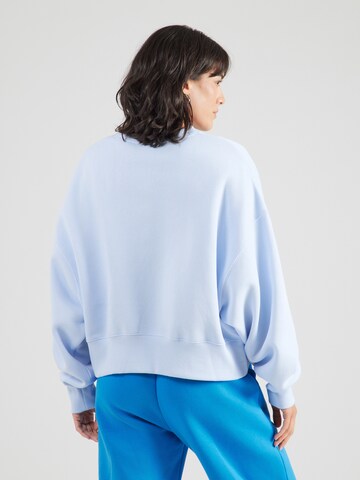 Nike Sportswear Sweatshirt 'Phoenix Fleece' in Blauw