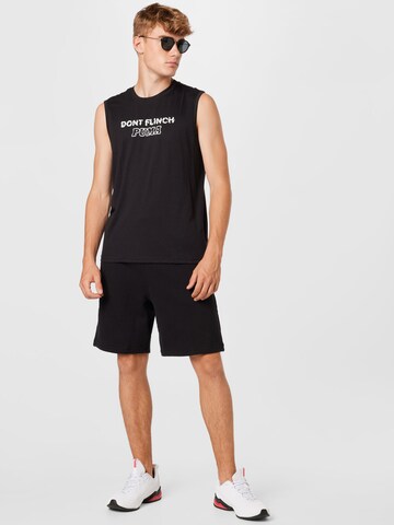 PUMA Performance Shirt 'Don`t Flinch' in Black