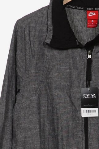 NIKE Jacket & Coat in M in Grey