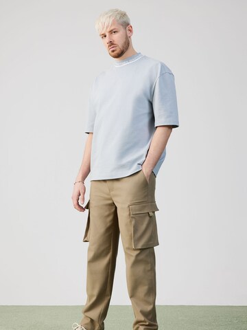 Tapered Pantaloni cargo 'Jakob' di ABOUT YOU x Rewinside in verde