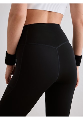 Aim'n Skinny Sports trousers in Black