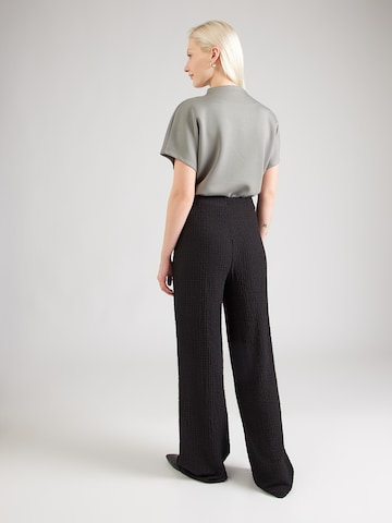 ABOUT YOU Bő szár Nadrág 'Nalani' - fekete
