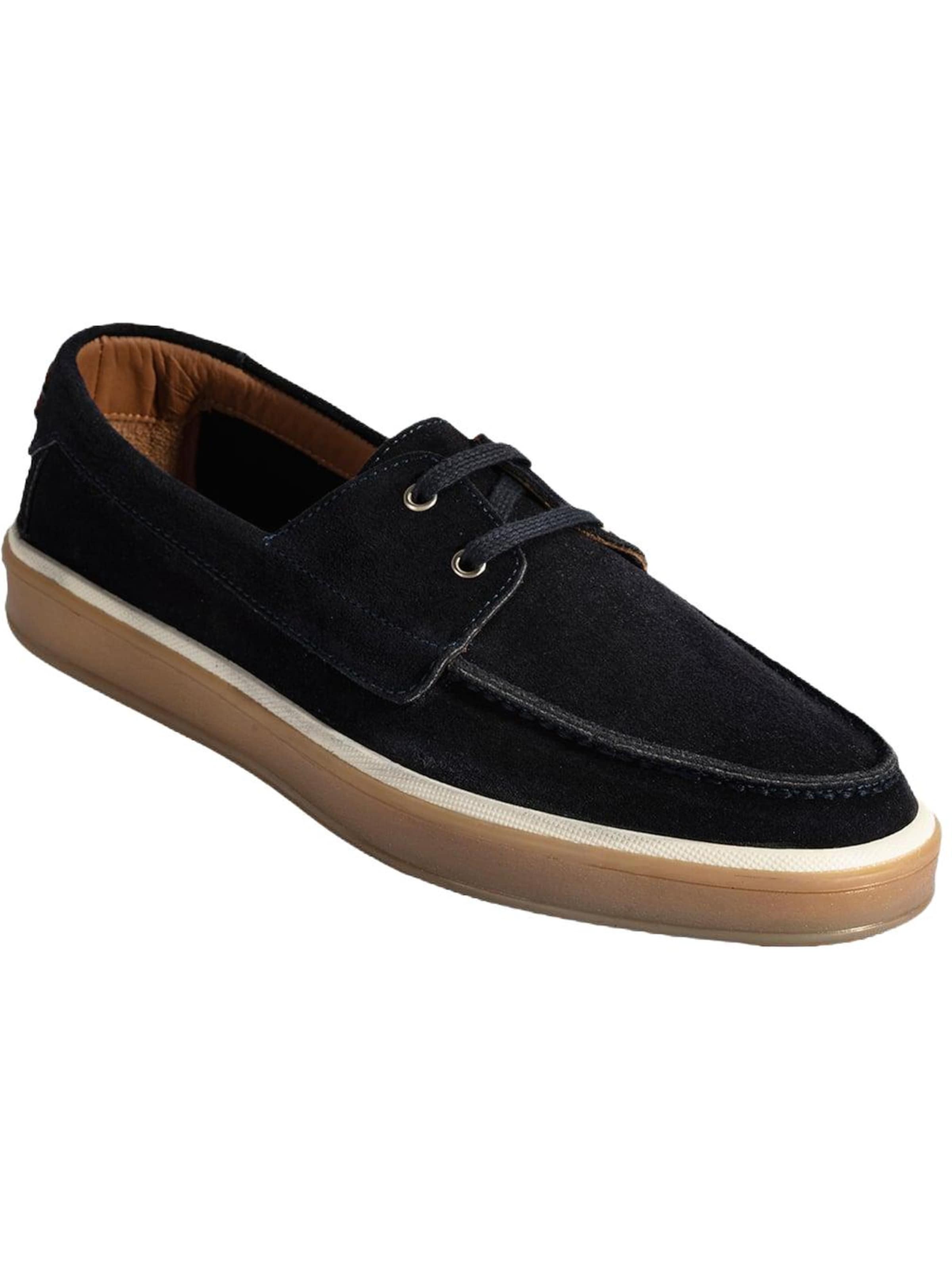 Desa Slip-ons in Blue: front