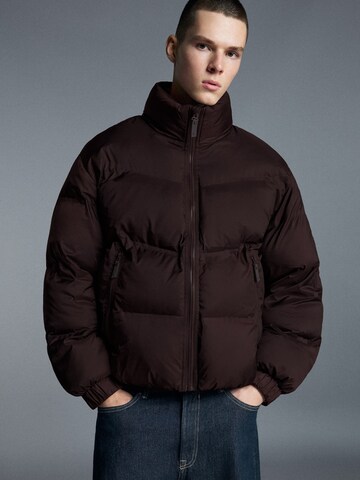 Bershka Winter jacket in Brown: front