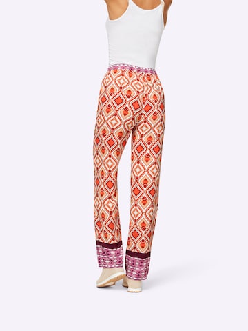 heine - Pierna ancha Pantalón en naranja