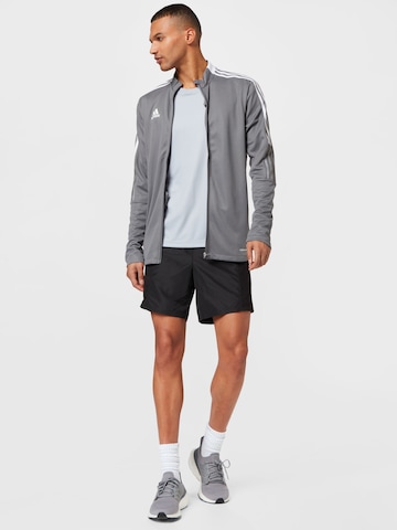 ADIDAS SPORTSWEAR - Skinny Casaco deportivo 'Tiro 21' em cinzento