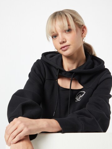 GUESS Sweatshirt in Schwarz