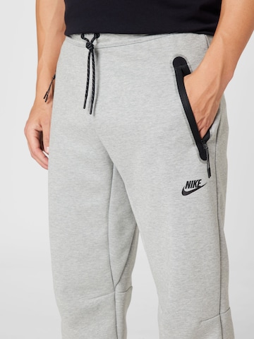 Nike Sportswear Regular Trousers in Grey