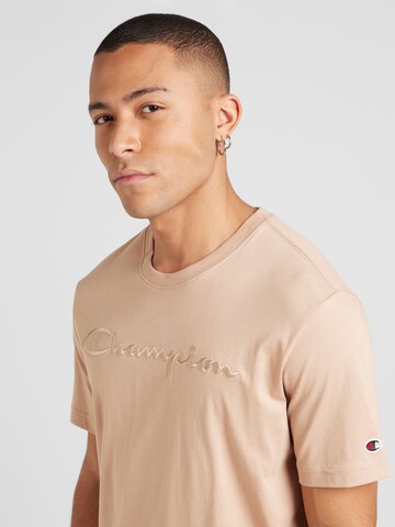Maglietta di Champion Authentic Athletic Apparel in marrone