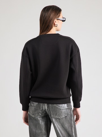 GUESS Sweatshirt in Schwarz