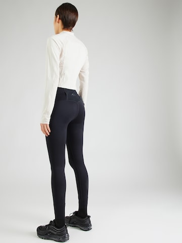 NIKE Skinny Sportsbukser 'Trail' i sort