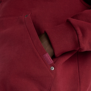 new balance - Sudadera con cremallera en rojo