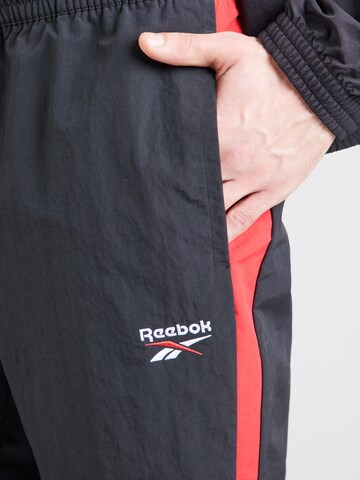 Reebok Tapered Sports trousers in Black
