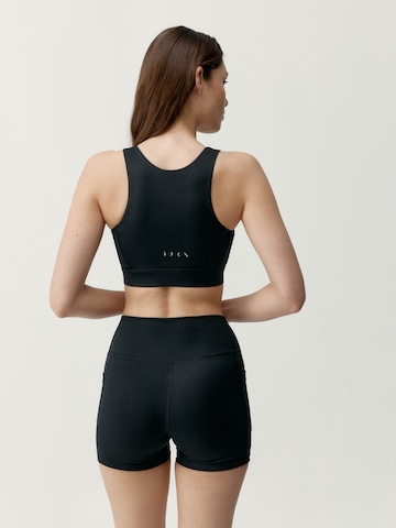 Skinny Haut de sport 'Eider' Born en noir