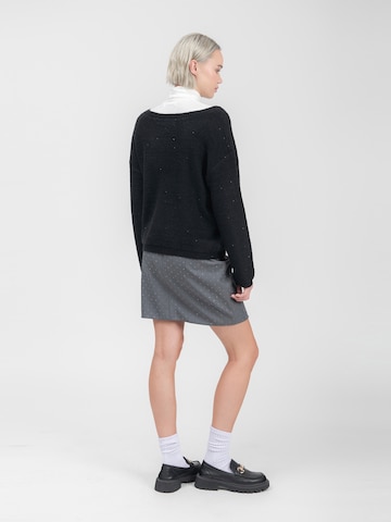 Influencer Sweter w kolorze czarny