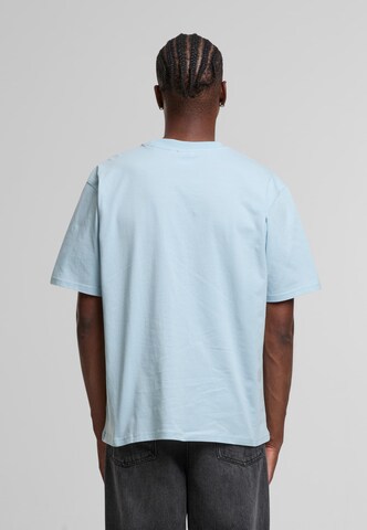 T-Shirt 'Originator' Karl Kani en bleu