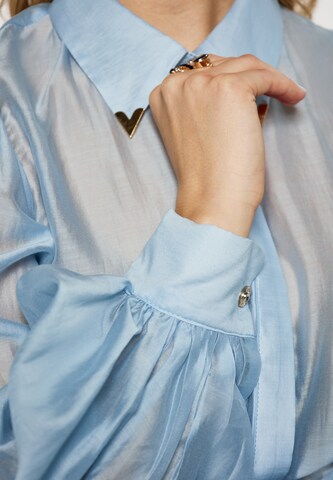 Camicia da donna di faina in blu