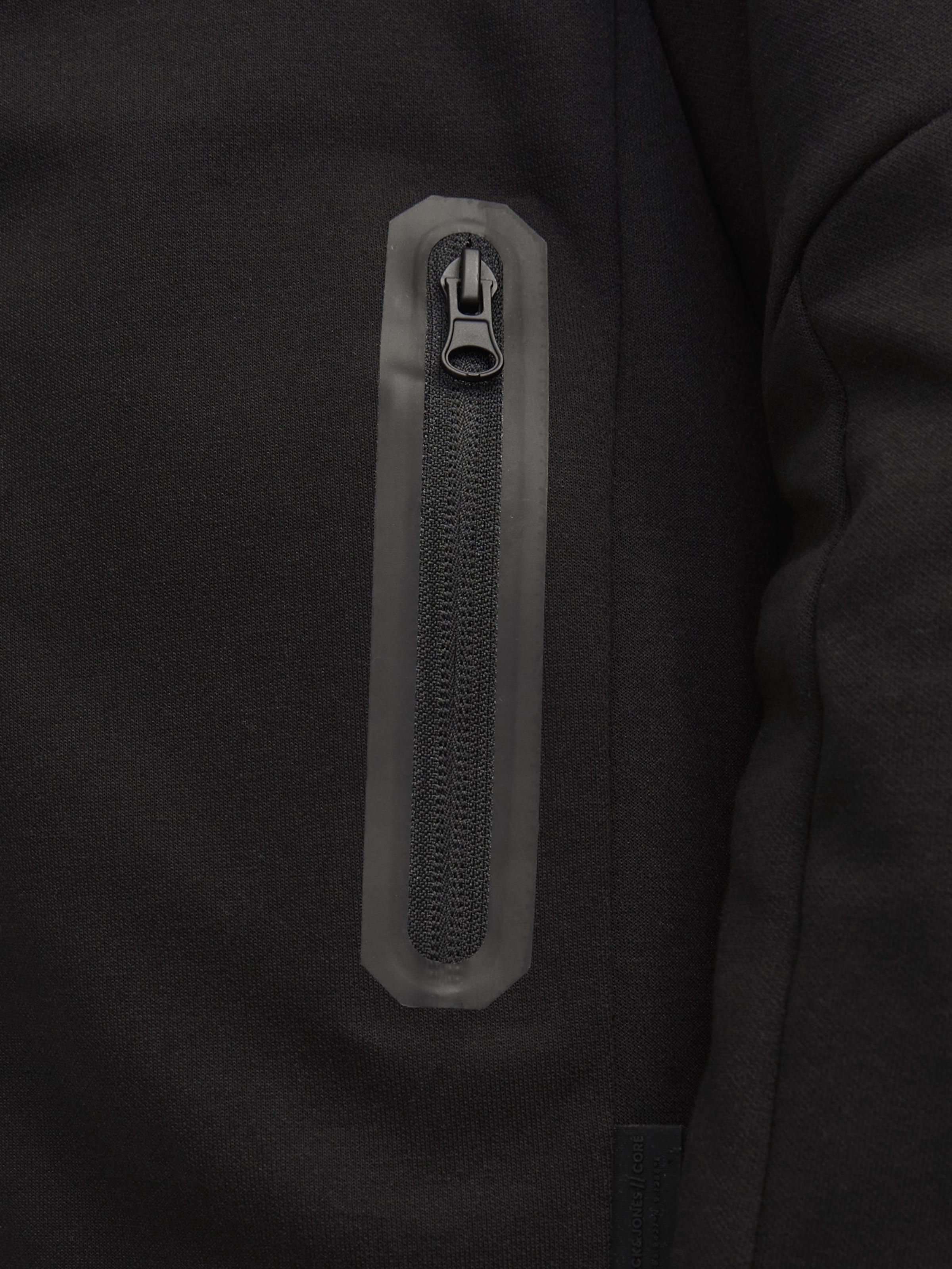 Veste de survêtement 'Fusion' Jack & Jones Junior en noir