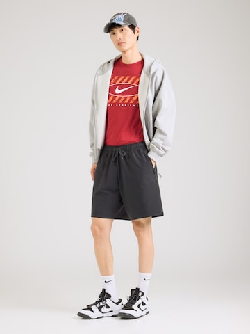 juoda Nike Sportswear Laisvas Kelnės