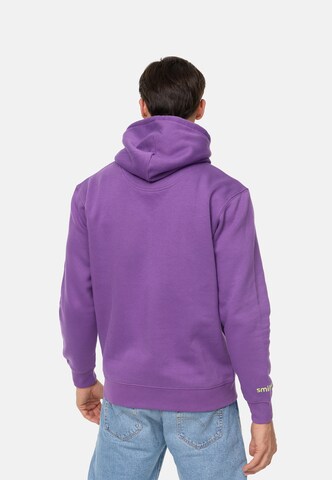 Sweat-shirt smiler. en violet