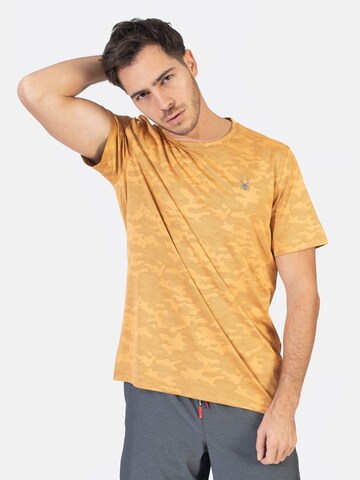 T-Shirt fonctionnel Spyder en or : devant