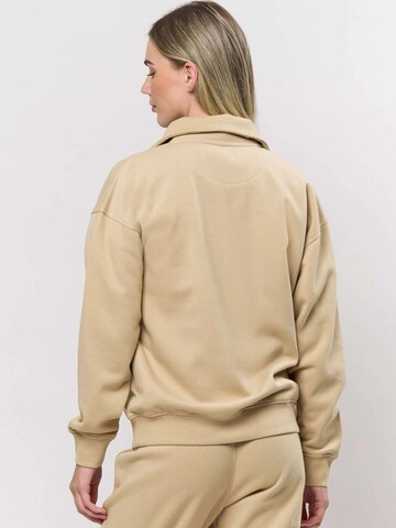 U.S. POLO ASSN. Neulepaita ' Katie ' värissä beige