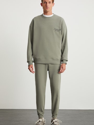 Grimelange Костюм для бега в Зеленый: спереди