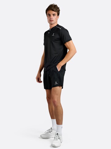 nordicdots - Camiseta funcional 'Pro Flex Polo - Black' en negro