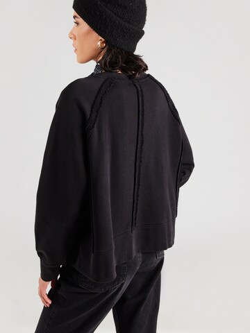 GUESS Originals Sweatshirt in Zwart